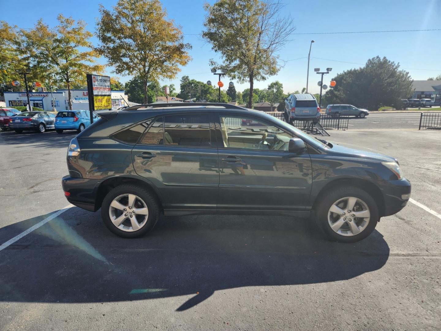 2005 LEXUS RX 330 AWD (JTJHA31U950) with an 3.3L V6 DOHC 24V engine, 5-Speed Automatic Overdrive transmission, located at 8595 Washington St., Thornton, CO, 80229, (303) 287-5511, 39.852348, -104.978447 - Photo#4